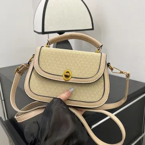 Features a Classic Saddle Silhouette with Gold tone Turn lock Hardware Blending Retro Elegance with Modern Casual Style