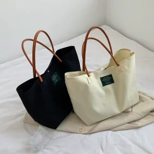 Minimalist street fashion large capacity tote bag new style solid color trendy canvas shoulder bag