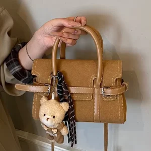 Premium Faux Suede Caramel Satchel Bag Elegant Women’s Handbag with Bear Accessory Top Handle and Crossbody Strap